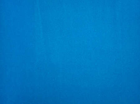 Blue felt fabric close-up. abstract background. The texture of the fibers. Velvet surface.