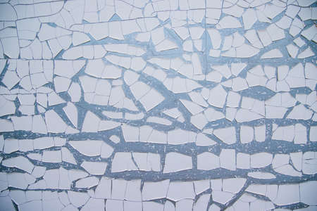 The texture of the wall with cracked white paint. The first layer on the metal surface will be...