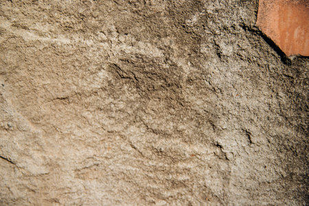 The texture of the stone is beige.Decorative stone or concrete. Rough texture.の写真素材