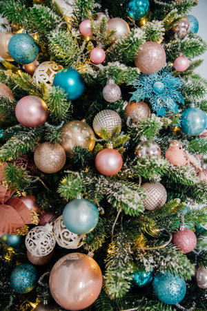 Branches of a Christmas tree decorated with toys for the new year. Christmas background.の写真素材