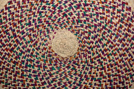 Woven mats and baskets from dried palm leaves with an enlarged images. Traditional art and handicrafts in Doha, Qatarの写真素材