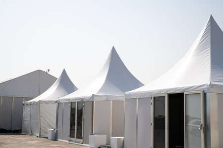 Event tents in an outdoor yard under a blue sky. Doha, Qatarの写真素材