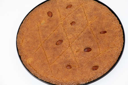 Almond basbousa tray with sweet honey syrup, basbousa is a middle eastern dessert that is usually baked in the month of Ramadan.の写真素材