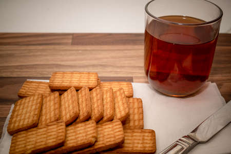 A cup of tea with biscuits for breakfast
