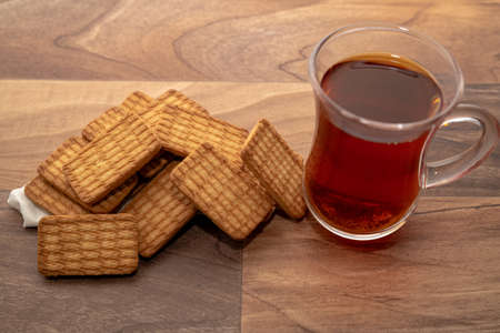 A cup of tea with biscuits for breakfast