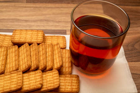 A cup of tea with biscuits for breakfastの写真素材