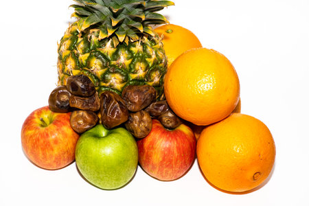 Fruits isolated on white background. Pineapple, apple, orange, grapefruitの写真素材
