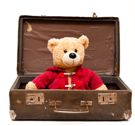 bear in old suitcase on the white backgroundの写真素材