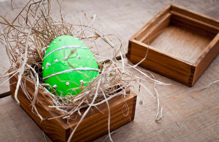 easter egg decoration on wooden backgroundの写真素材