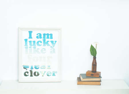 Motivating grunge wooden poster quote i am luckylike a four leaf cloverの写真素材