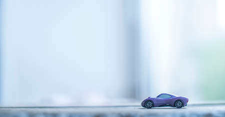 Toy model of modern car in nursery roomの写真素材
