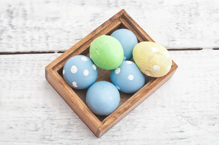 easter quail eggs decoration on wooden backgroundの写真素材