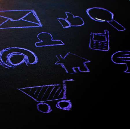 collection of web icons is drawn by the chalk on the blackboardの写真素材