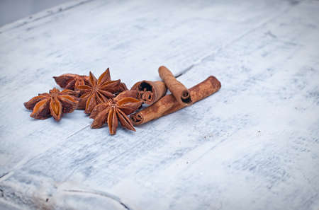 cinnamon stick and star anise spice on wooden backgroundの写真素材