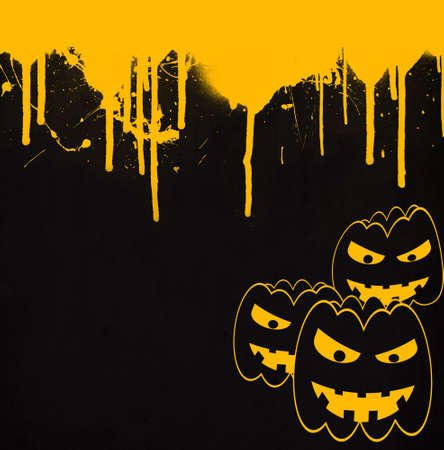 yellow halloween splatter and spooky pumpkinsの写真素材