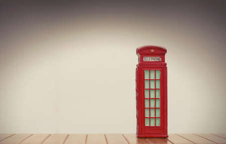 vintage red british phone booth souvenir on white backgroundの写真素材