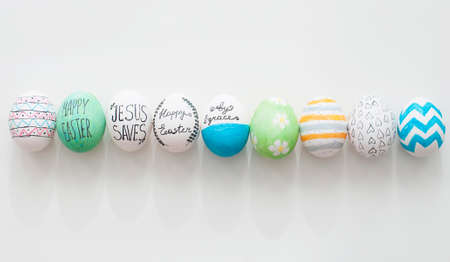 Decorated easter eggs set on white backgroundの写真素材