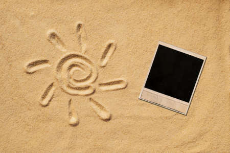 sand sun print on a beach in a summer sunsetの写真素材