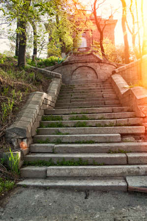 old antique stone stairs to abandoned haunting houseの写真素材