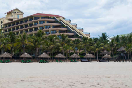Hotel, palms and white sand in the My Khe beach, Danang, Vietnamのeditorial素材