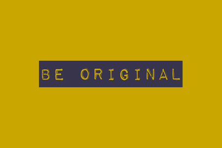 Be original motivational words on yellow backgroundの写真素材