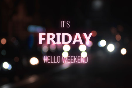 Neon sign 'I'ts friday, hello weekend'の写真素材