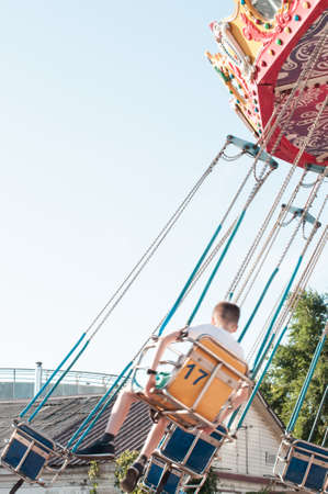 Funfair. Carousel. Amusement park. Nostalgic. Summer holidaysの写真素材