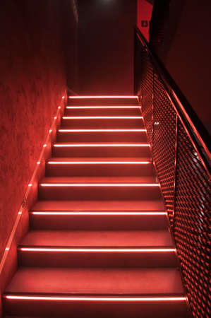 Red led neon light stairs at the night clubの写真素材
