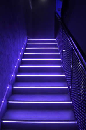 Blue led neon light stairs at the night clubの写真素材