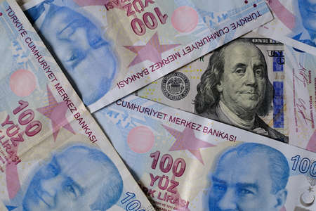 US dollars and Turkish Liras on top of each other completely covering the screen