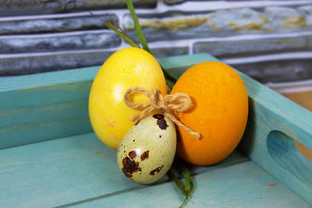 The yellow painted Easter eggsの写真素材