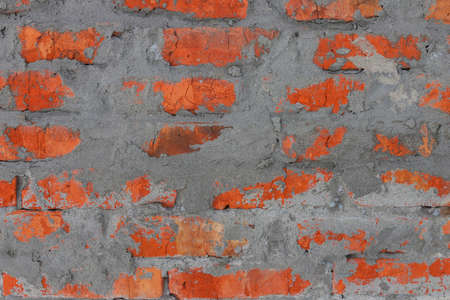 Texture of old rough red brick wallの写真素材