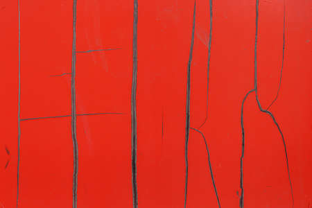 Rough painted red surface texture backgroundの写真素材