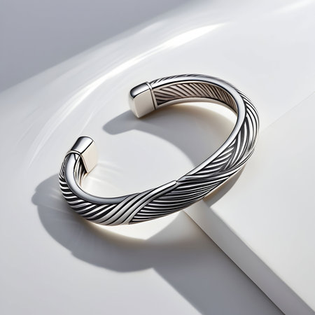 Silver bracelet on a white background. 3d rendering. Computer digital drawing.の素材