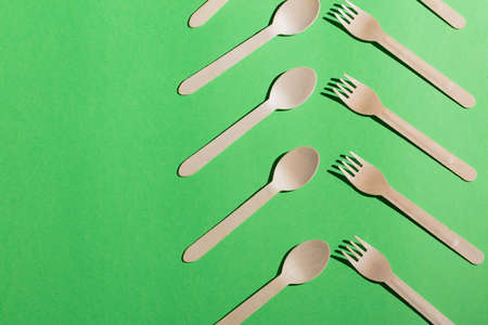 a set of wooden forks and spoons, copy space, creativity conceptの写真素材