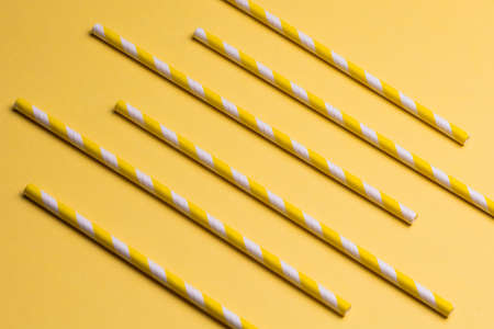 Geometric composition of yellow striped sticks on the yellow background.exercises for brain, mindの写真素材