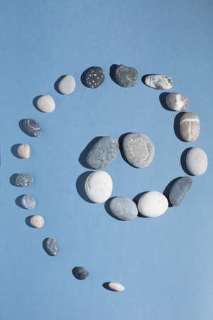 sea pebbles in the form of snail, top view photo.hobby, lifestyle. top view photoの写真素材