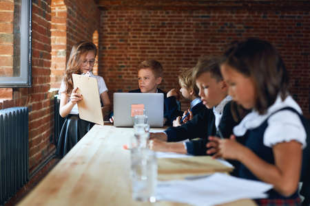 young office workers discussing the problems of company, close up photo