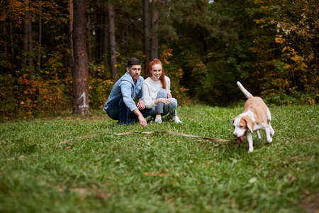 family having great time with their adotrable favorite pet. lifestyle, free time, spare time