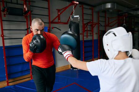 intense training with personal coach. close up photoの写真素材