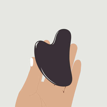 Female hand holding Gua Sha massage tool. The Black Obsidian Facial Lifting scraper. Vector color illustration template.のイラスト素材