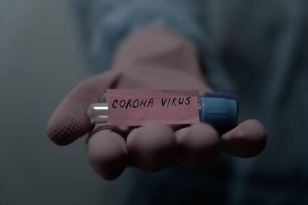 Concept of coronavirus quarantine. MERS-Cov. Novel coronavirus (2019-nCoV). Positive Coronavirus test blood sample. 2019-nCoV pandemicの写真素材