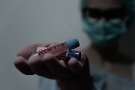 Concept of coronavirus quarantine. MERS-Cov. Novel coronavirus (2019-nCoV). Positive Coronavirus test blood sample. 2019-nCoV pandemicの写真素材