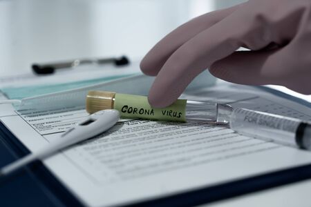 Concept of coronavirus quarantine. MERS-Cov. Novel coronavirus (2019-nCoV). Positive Coronavirus test blood sample. 2019-nCoV pandemicの写真素材