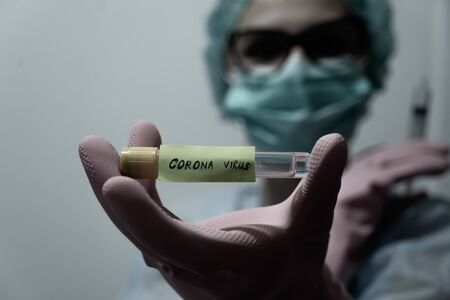 Concept of coronavirus quarantine. MERS-Cov. Novel coronavirus (2019-nCoV). Positive Coronavirus test blood sample. 2019-nCoV pandemicの写真素材