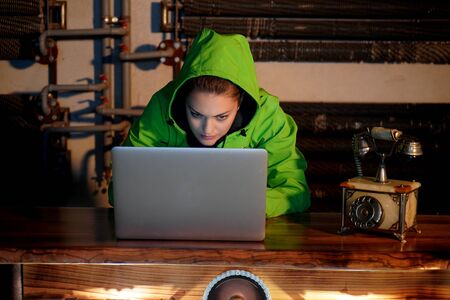 Young Female Hacker Breaks into Corporate Data Servers from His Underground Hideout. Place Has Dark...