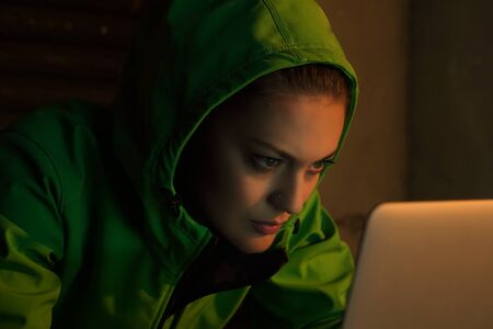 Young Female Hacker Breaks into Corporate Data Servers from His Underground Hideout. Place Has Dark...