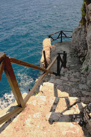 Going downstairs to the sea / oceanの写真素材