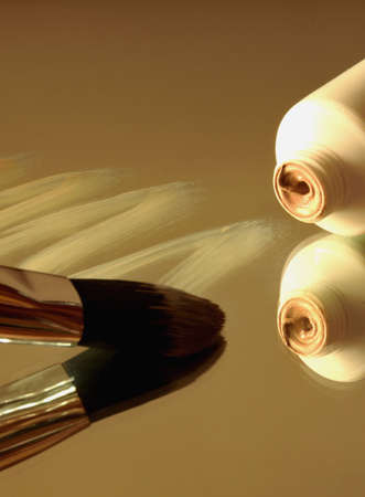 Fluid foundation to brush and Their reflection in the mirrorの写真素材