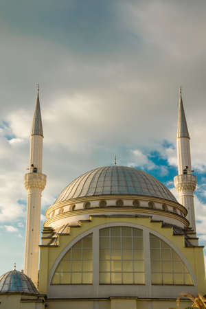 View of mosque at the background of the stormy skyの写真素材